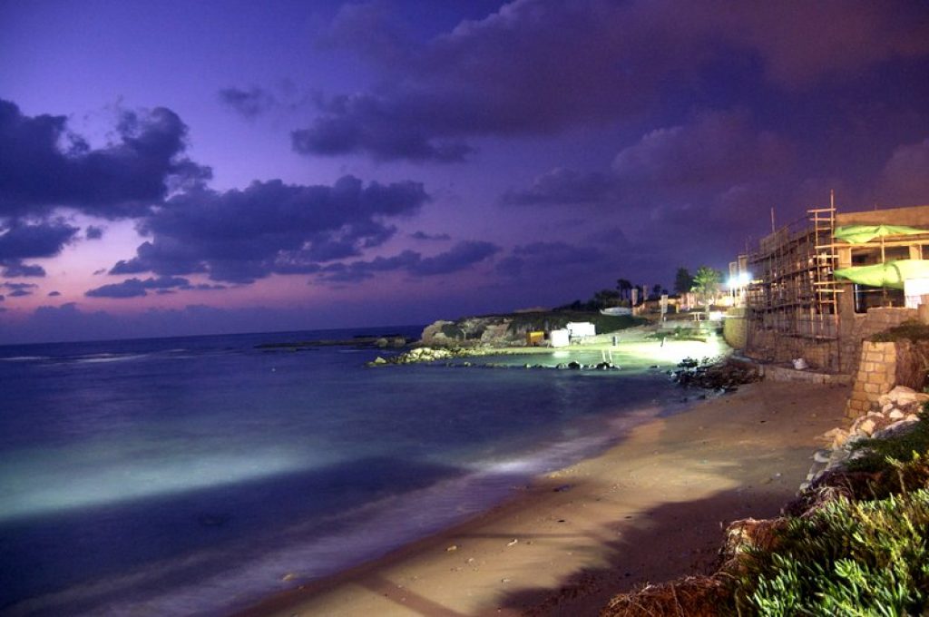 the ancient port city of caesarea at night